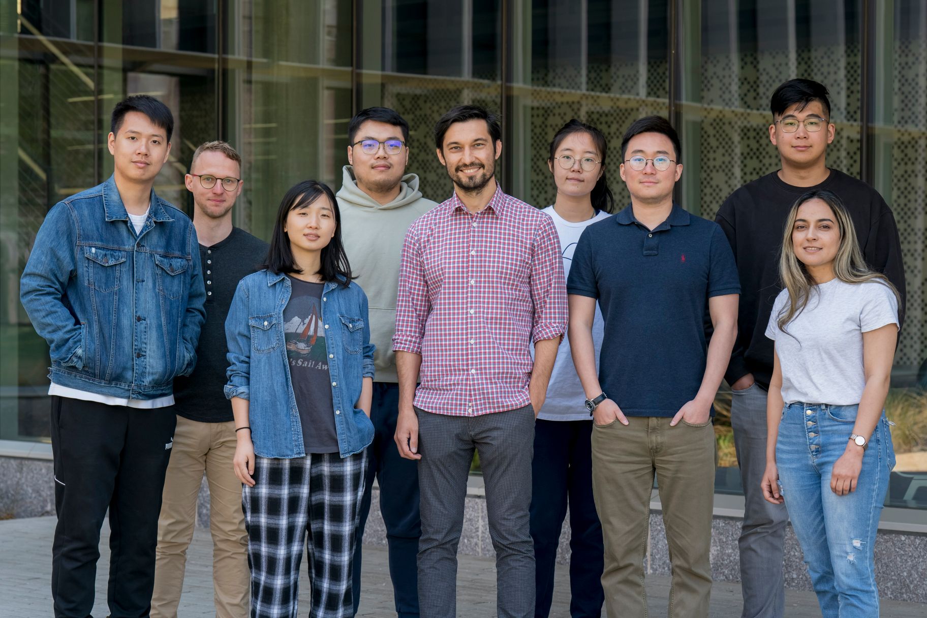 Members of the Computational Imaging Group standing outside the McKelvey Hall